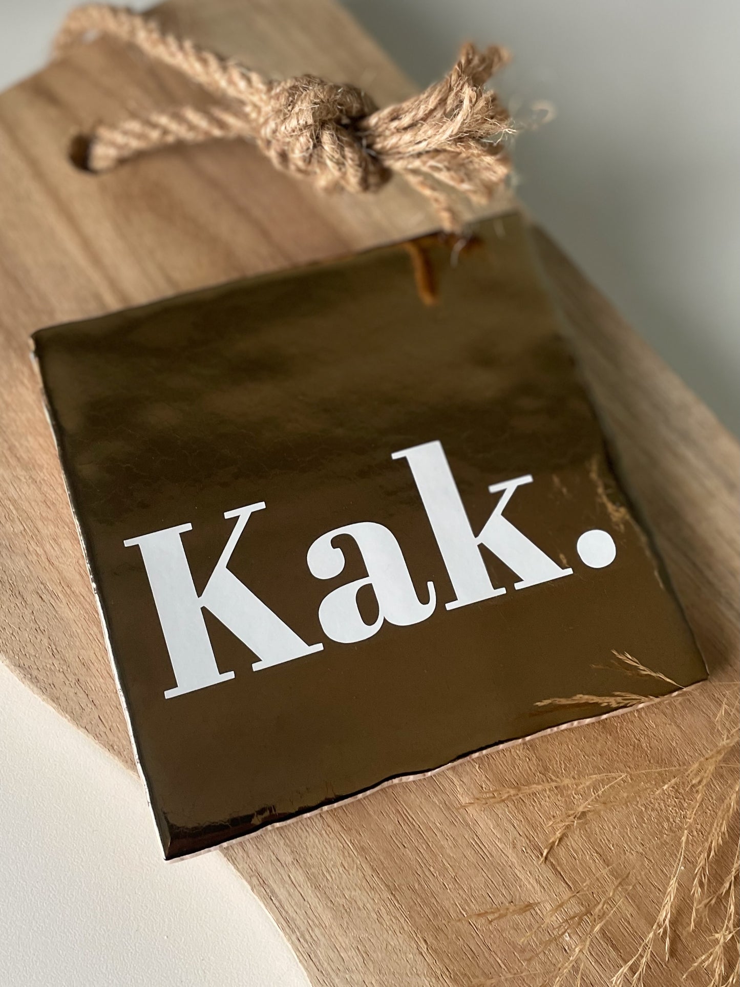 Tegeltje Kak.